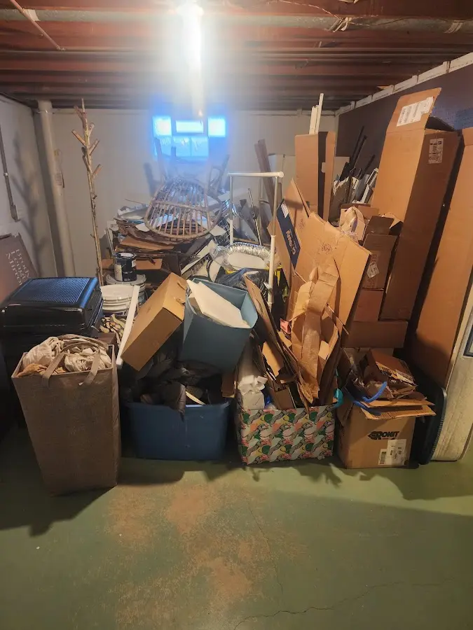 Roll-off dumpster container at job site for 20 Yard Dumpster Rental in Davie